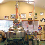 Inside the distillery, metallic still